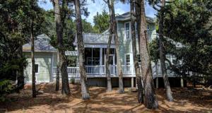a house with trees in front of it at Ingen Trafikk in Southport