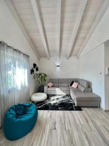 A seating area at Terme Apartment Levico