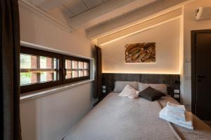 Postel nebo postele na pokoji v ubytování Bed & Breakfast Bure Alto
