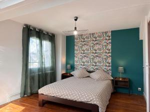 Giường trong phòng chung tại Agréable maison de ville 6 personnes