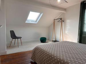 Giường trong phòng chung tại Agréable maison de ville 6 personnes