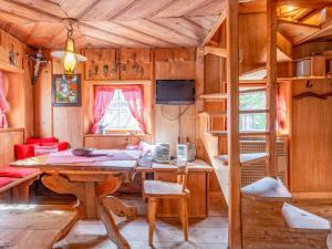 a room with a desk and a bunk bed at Zinnhäusel in Alpbach