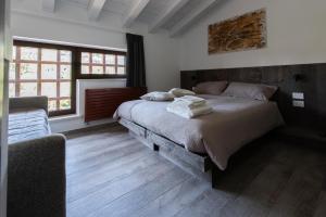 Postel nebo postele na pokoji v ubytování Bed & Breakfast Bure Alto