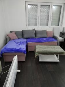 Postel nebo postele na pokoji v ubytování Kidy place