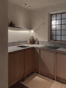 a kitchen with a sink and a counter top at Loggia Studio in Edinburgh