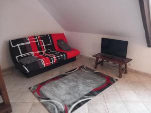 Μια τηλεόραση ή/και κέντρο ψυχαγωγίας στο confortable appartement duplex +1 φωτογραφίες