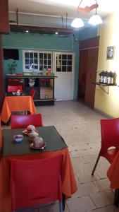 Ein Restaurant oder anderes Speiselokal in der Unterkunft Hotel Nuevo Real 