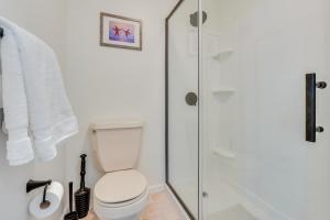 a bathroom with a toilet and a shower at Dog-Friendly Fishkill Tiny House in Wine Country in Fishkill