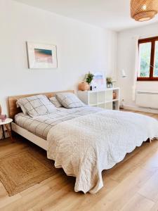 Ένα ή περισσότερα κρεβάτια σε δωμάτιο στο Loft entre mer et campagne à 5 min d'Ajaccio classé 4 étoiles