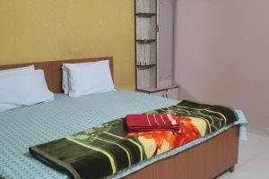 Кровать или кровати в номере Atithi Devo Bhava - RadhaNiwas