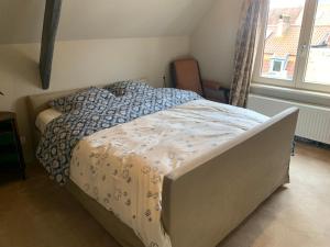 Postel nebo postele na pokoji v ubytování LE NID DU PRINCE