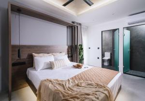 Posteľ alebo postele v izbe v ubytovaní Alcyone Studios and Apartments