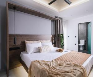 Posteľ alebo postele v izbe v ubytovaní Alcyone Studios and Apartments