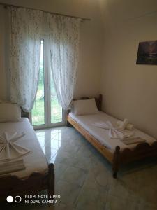 Cama o camas de una habitación en Villa Shendelli