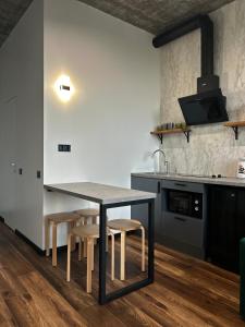 Kuchyňa alebo kuchynka v ubytovaní Apartments in Grani