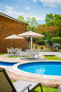 Bazén v ubytování Hotel Nututun Palenque nebo v jeho okolí