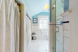 a bathroom with a shower and a toilet at Harbor Haven in Seattle +17 photos