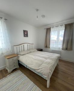 Postel nebo postele na pokoji v ubytování GRAB HOUSE Swords