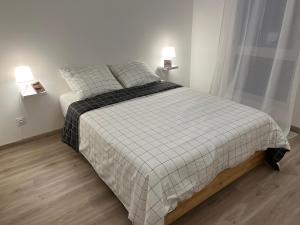 Postel nebo postele na pokoji v ubytování Appartement cosy à Bron