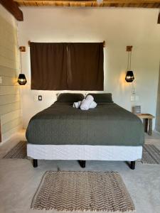 Postel nebo postele na pokoji v ubytování MARIBY HOLBOX