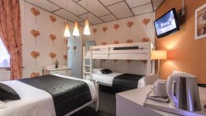 Krevet ili kreveti na sprat u jedinici u okviru objekta Hotel Du Moulin d'Or