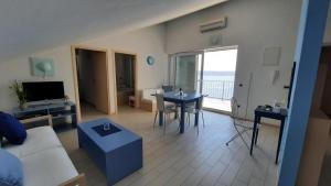 TV a/nebo společenská místnost v ubytování Seaside 11