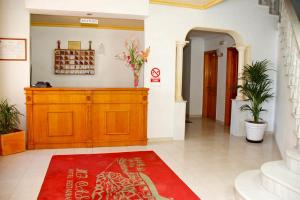 Hol lub recepcja w obiekcie Hotel Mi Casa