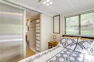 a bedroom with a bed and a window at Georgia Tiny Home on Farm Retreat Hike On-Site! in Lithonia