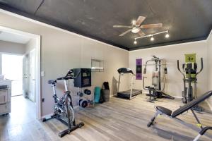 a gym with bikes and exercise equipment in a room at Georgia Tiny Home on Farm Retreat Hike On-Site! in Lithonia