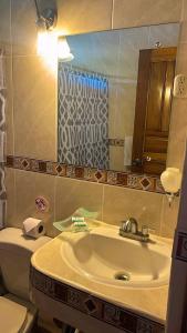 Koupelna v ubytování Hotel Javy