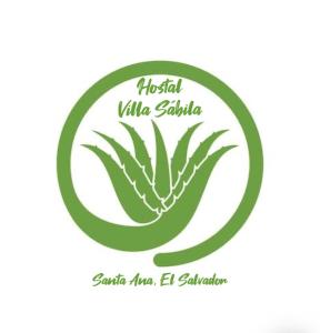 un signe avec une plante verte en cercle dans l'établissement Hostal Villa Sabila, à Santa Ana