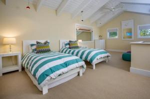 a bedroom with two beds in a room at Exclusive Wine Country Estate - The Haven in Healdsburg +28 photos