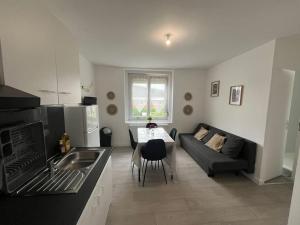 Ruang duduk di Le flowers cottage 30m² 4 personnes +21 gambar