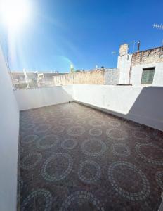 a view from the roof of a building with a brick floor at Casa Ciao in Deán Funes