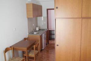 Kuchyň nebo kuchyňský kout v ubytování Apartments Maslina