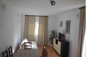 Postel nebo postele na pokoji v ubytování Apartments Maslina