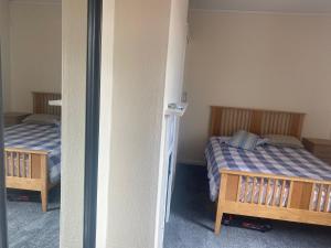 a room with two beds in a room at Renton Residence in Renton