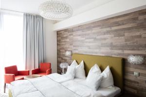 Postel nebo postele na pokoji v ubytování Hotel Freud