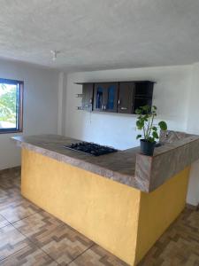 a kitchen with a counter top in a room at Casa campestre in Jericó