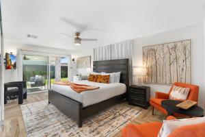 a bedroom with a bed and a living room at 3BD Spa & Heated Pool Old Town Vista Del Camino in Scottsdale