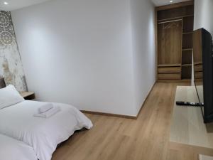 Postel nebo postele na pokoji v ubytování Eden Room SCH