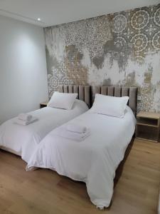 Postel nebo postele na pokoji v ubytování Eden Room SCH