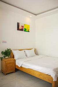 Katil atau katil-katil dalam bilik di Hotel Minh Thu - Open 24h