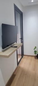 TV a/nebo společenská místnost v ubytování Eden Room SCH
