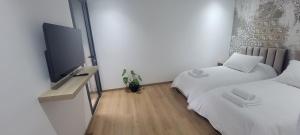 Postel nebo postele na pokoji v ubytování Eden Room SCH