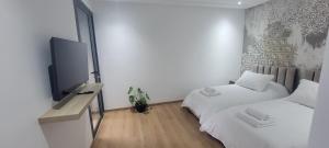 Postel nebo postele na pokoji v ubytování Eden Room SCH