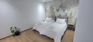 Postel nebo postele na pokoji v ubytování Eden Room SCH