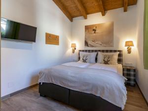 Postel nebo postele na pokoji v ubytování Luxury Tauern Suite Walchen Kaprun 4