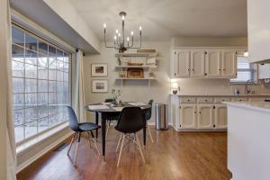 a kitchen with a table and chairs and a window at Family Home 5 Beds 3 Baths By Oc in Edmond