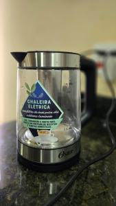 un recipiente de comida sentado en la parte superior de un mostrador en 204 - Loft de luxo com Alexa e Ar condicionado, en Belo Horizonte 10 fotos más